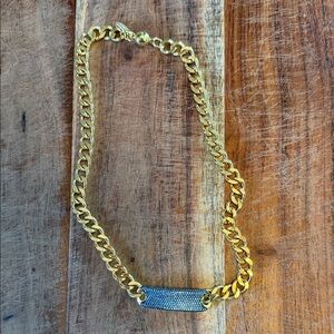 Elegant Gold Bracelet with Silver Detail